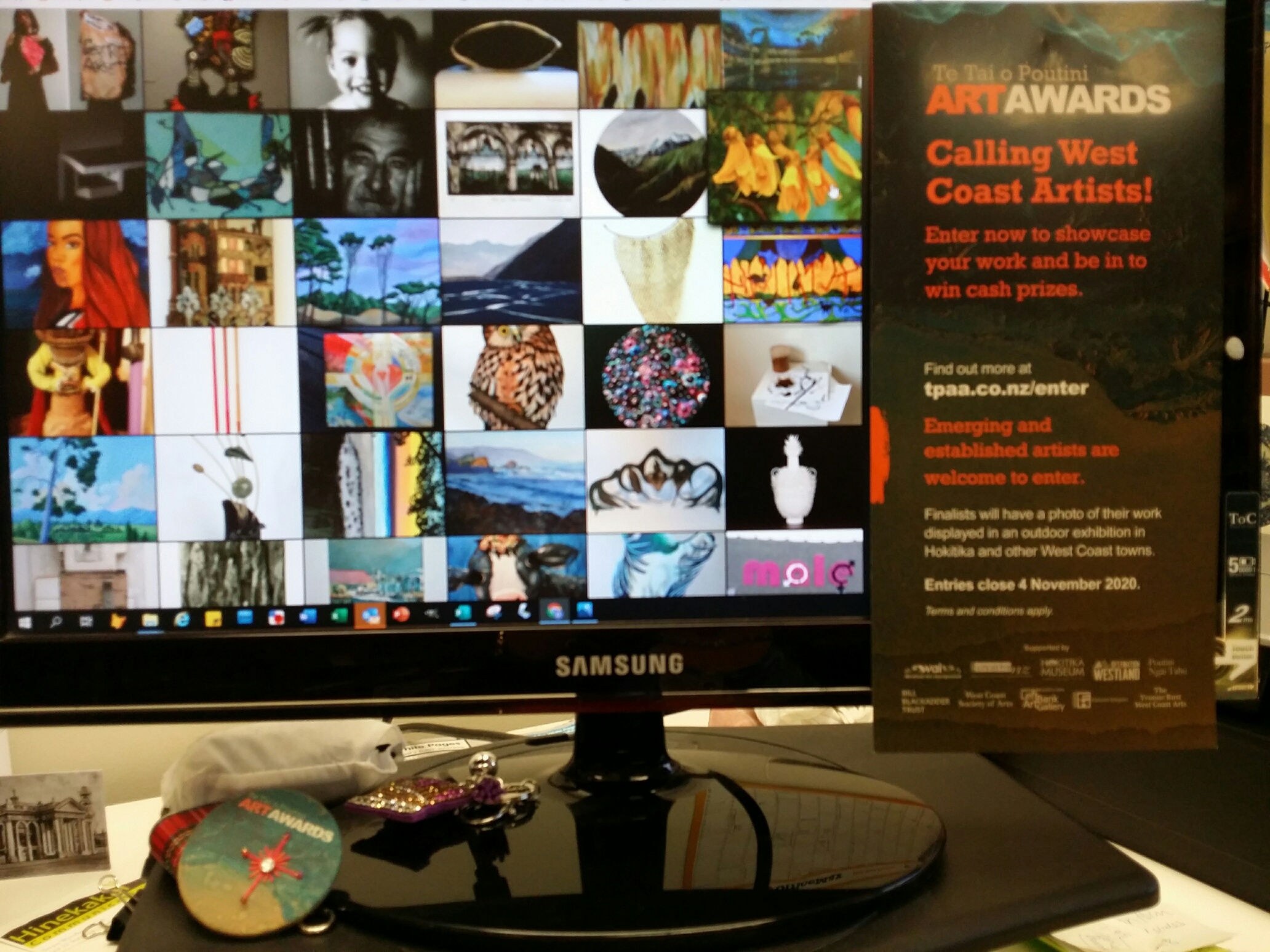 Artwork entries displayed on a computer screen Artwork entries displayed on a computer screen